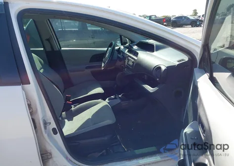 2013 Toyota Prius C One from USA, damaged, VIN JTDKDTB30D1056204